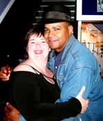 Guy Davis celebrates a succesful gig with a fan in the Riverside Music Room Bar