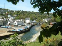 The river, the boat park and the Shore Marquee 2005 by Roger Pink